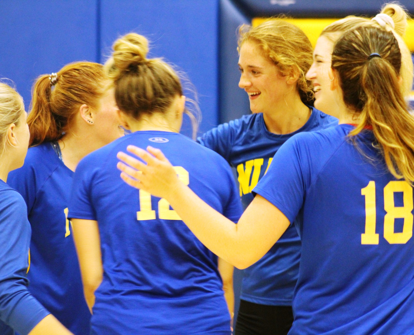 NIACC players celebrate a point in last Friday's scrimmage against Iowa Central.