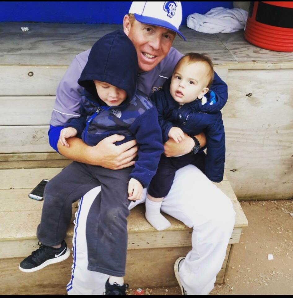 NIACC coach Travis Hergert with his two sons Brody and Owen after his 100th career win in 2015.