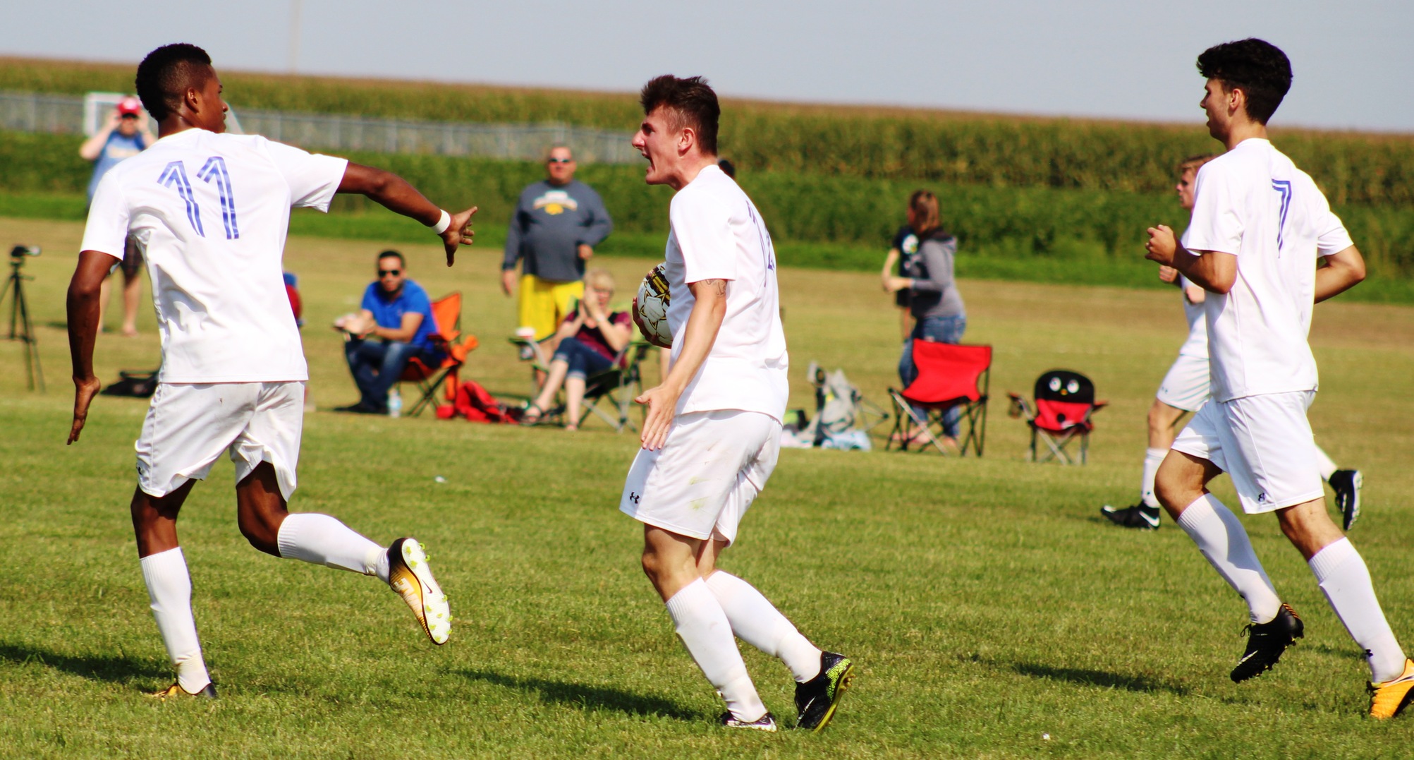 NIACC's Jack Doyle (center) celebrates his goal second-half in Saturday's match against Marshalltown CC.