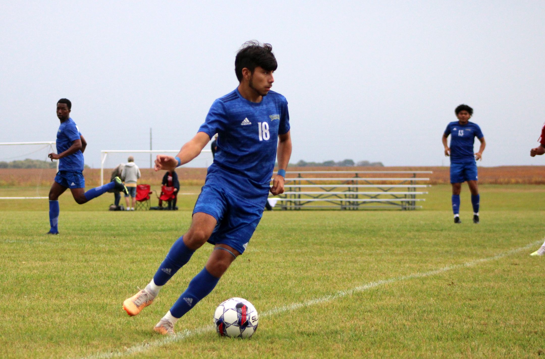 NIACC's Luis Montero moves the ball up the field in Saturday's match against Scott CC.