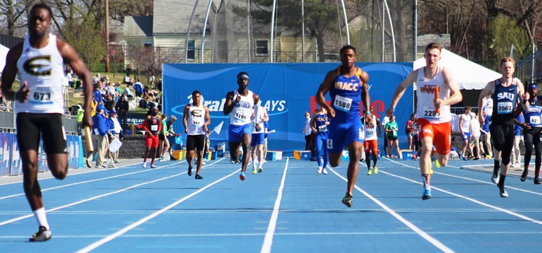 Deionte Ganzy runs the final leg of the 4x100 at the Drake Relays.
