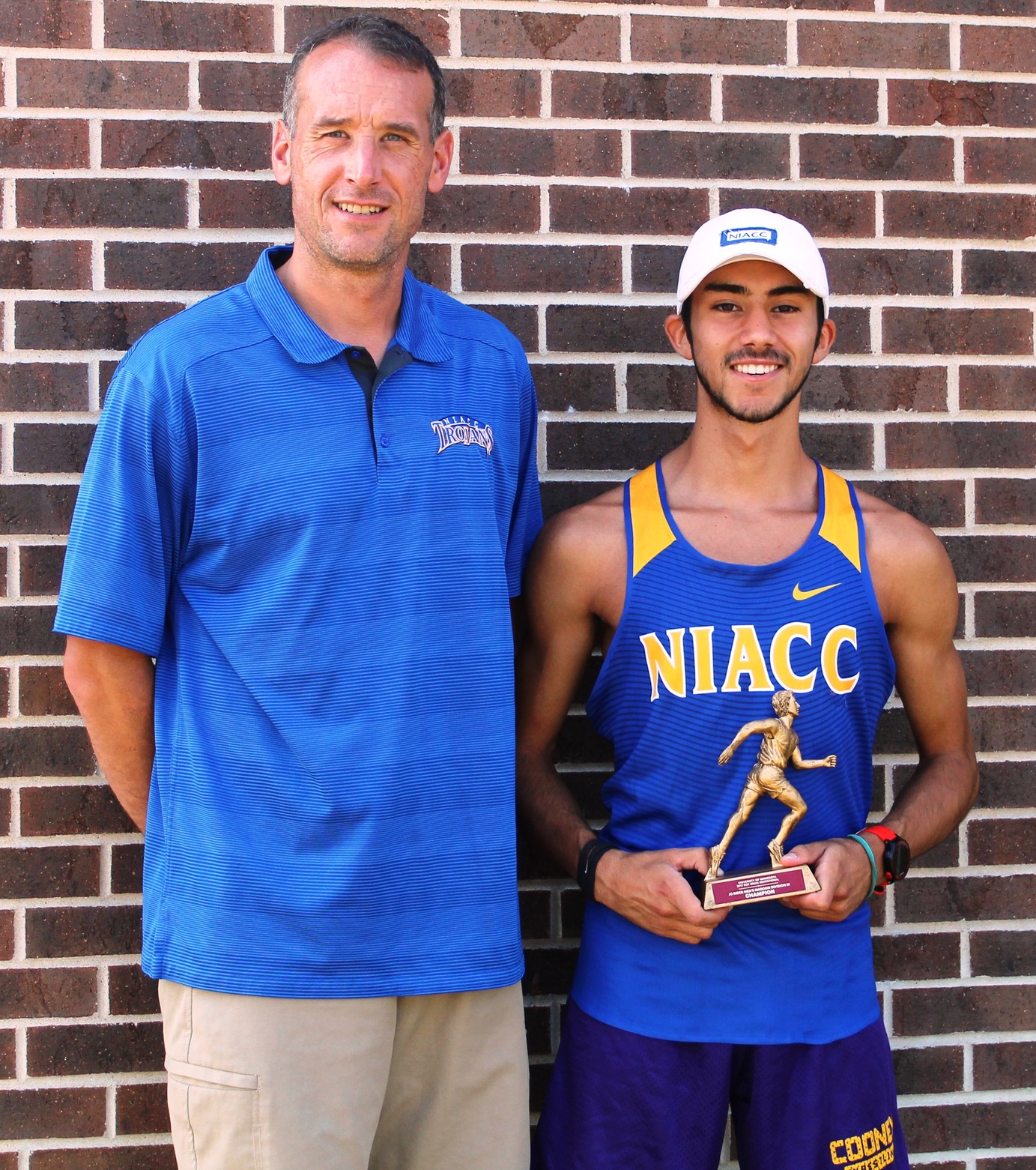 NIACC's Brian Jacques (right) and his coach Curtis Vais.