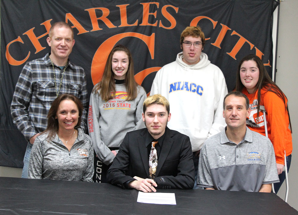 Charles City's Gavin Connell (front center) signed a national letter of intent to run cross country at NIACC in the fall of 2018. Photo courtesy of Charles City Press.
