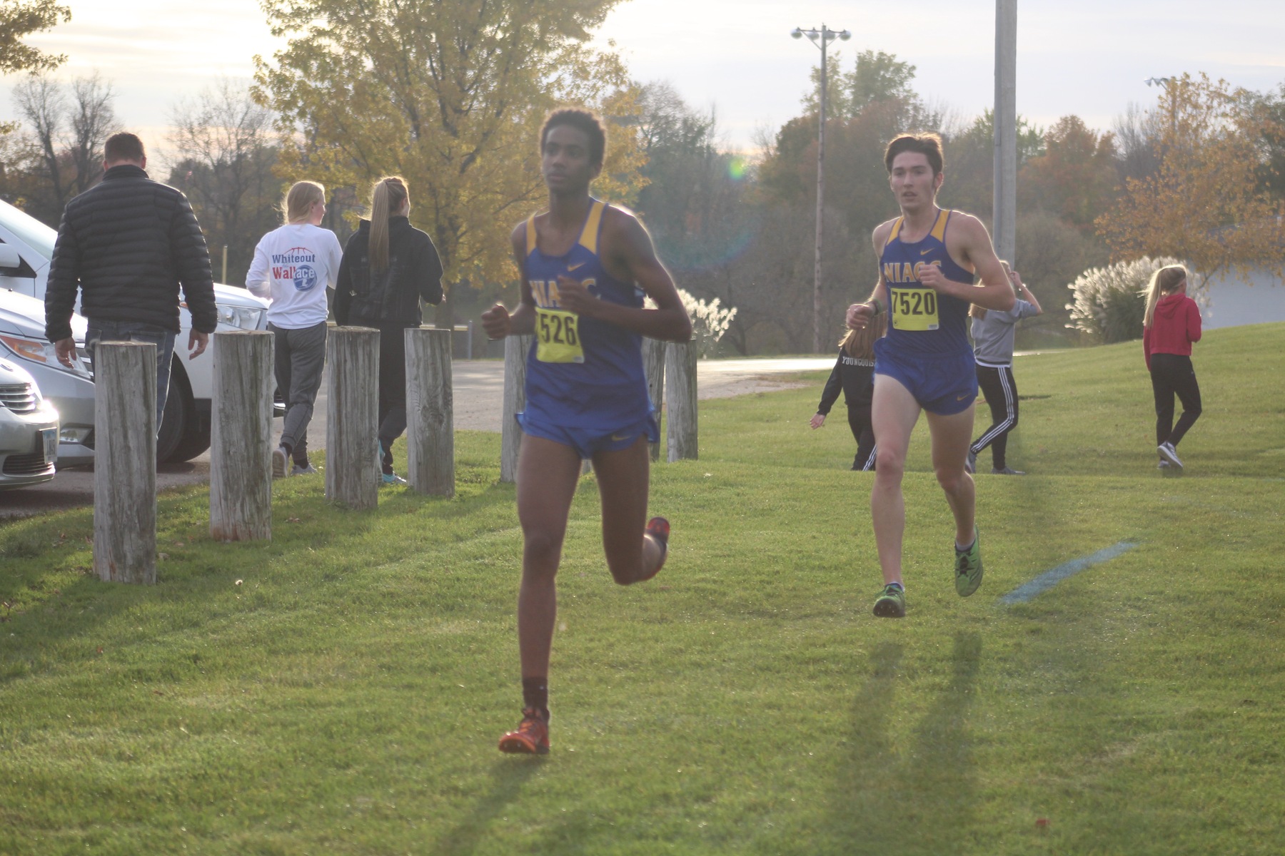 NIACC's Abdiaziz Wako (front) and Gavin Connell run at Friday's regional meet.