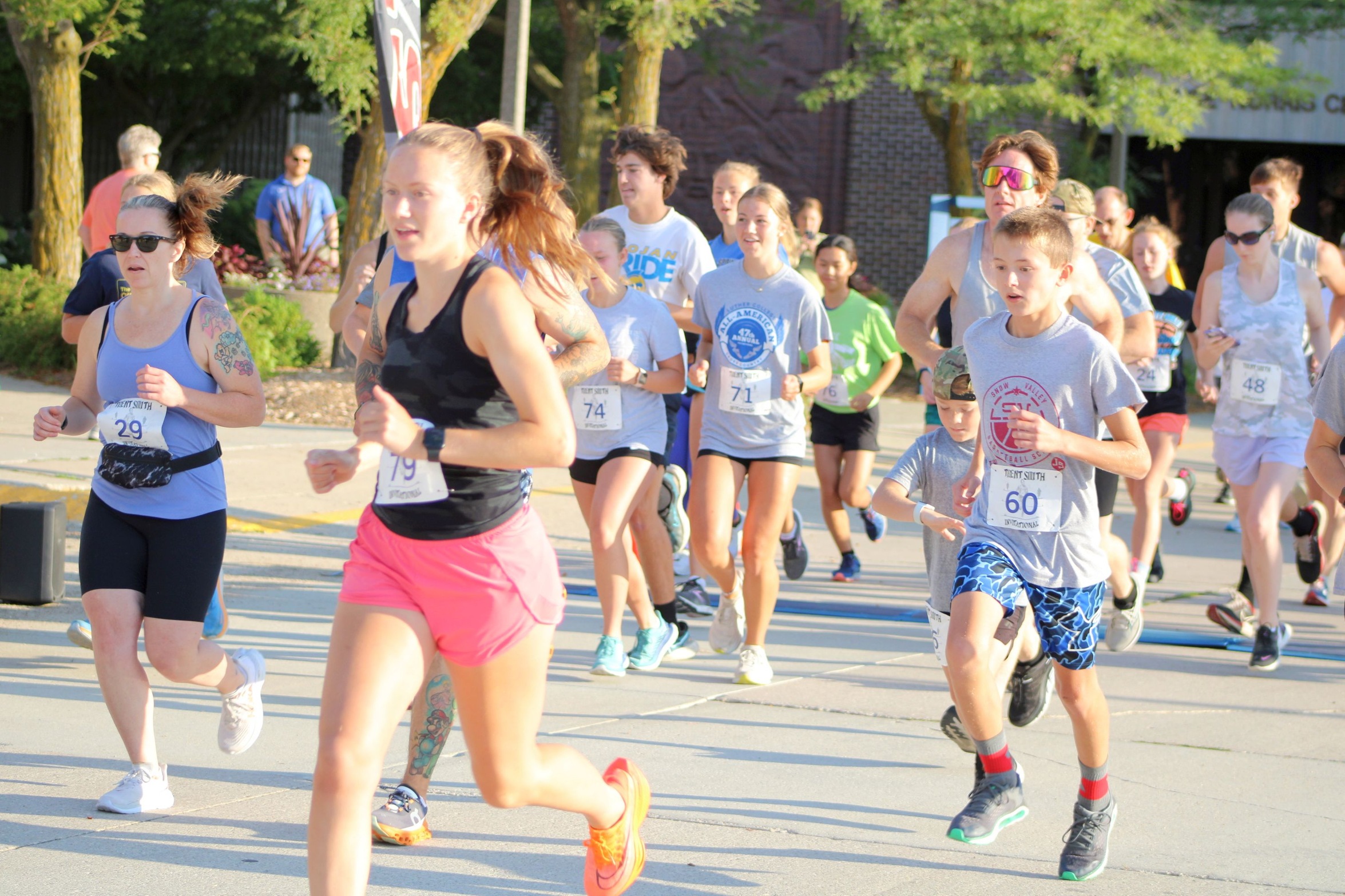Audra Mulholland (front) of Mason City was the 10K female winner at Saturday's Robert's Run on the NIACC campus.