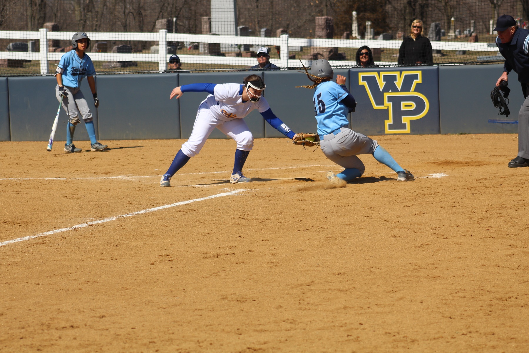 NIACC pitcher Courtney Johannes tags out Iowa Central's Alyssa Dema in the first game of Friday's doubleheader.