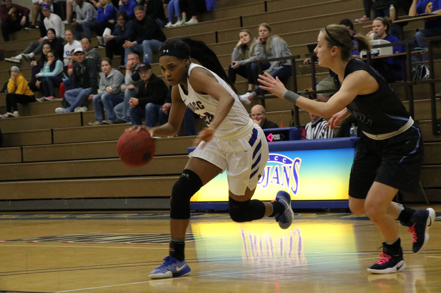 NIACC's Khalilah Holloway drives to the basket in Tuesday's game against Iowa Central.