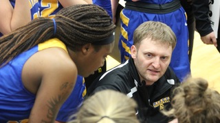 NIACC coach Todd Ciochetto talks on the bench during a timeout.