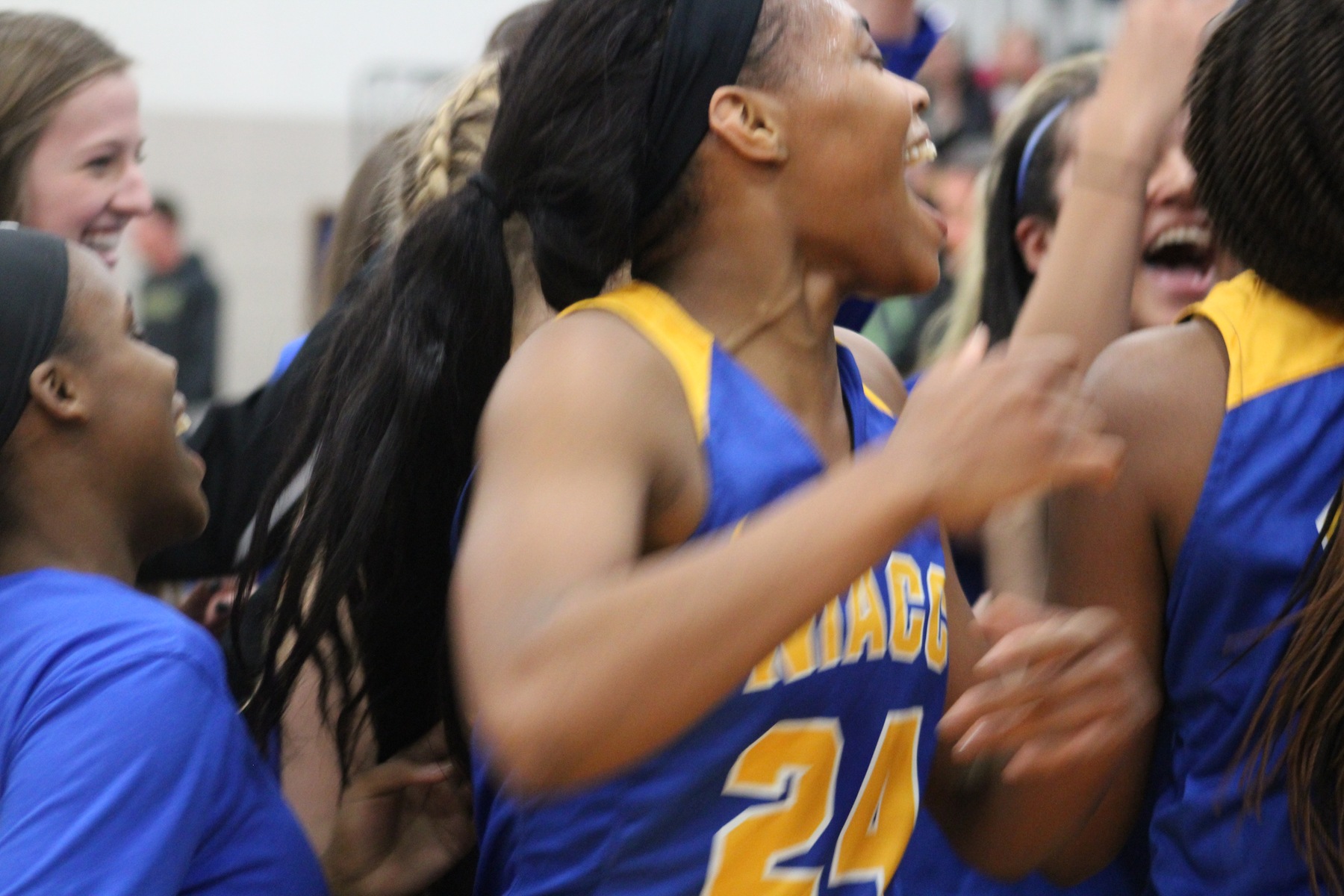 Khalilah Holloway celebrates after NIACC advanced to the regional title game with Thursday's 90-80 win over No. 11 DMACC.