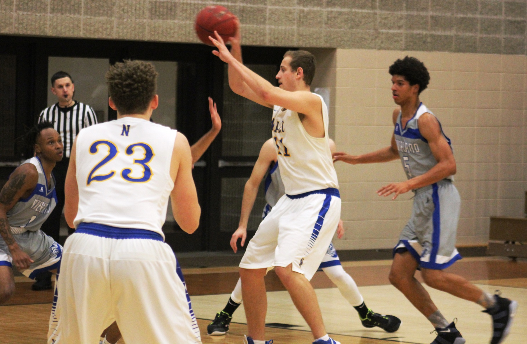 NIACC's Jaycob Payne passes the ball in the first half of Tuesday's game against Riverland CC.