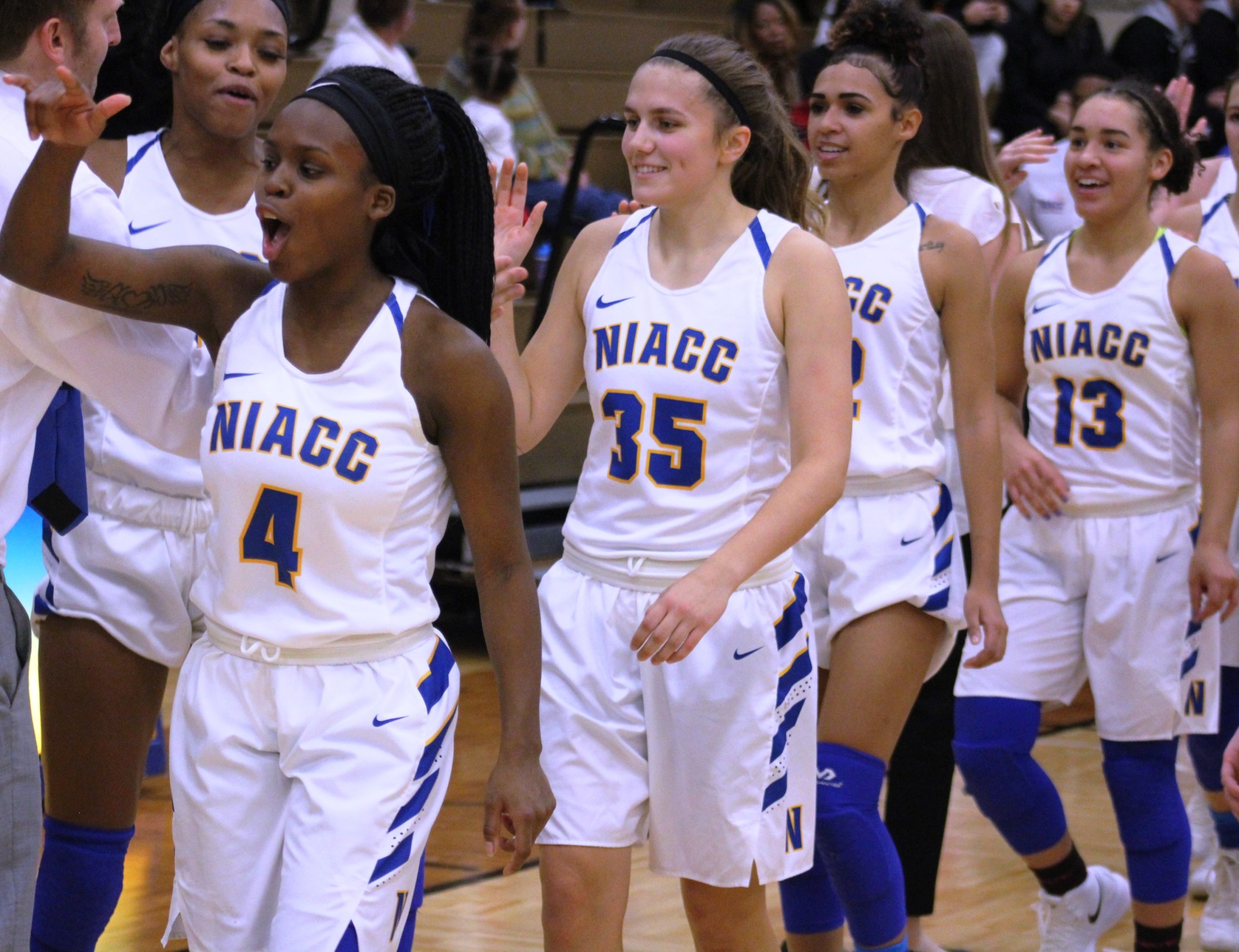 NIACC players are all smiles after Saturday's 98-89 win over Iowa Western in the NIACC gym.