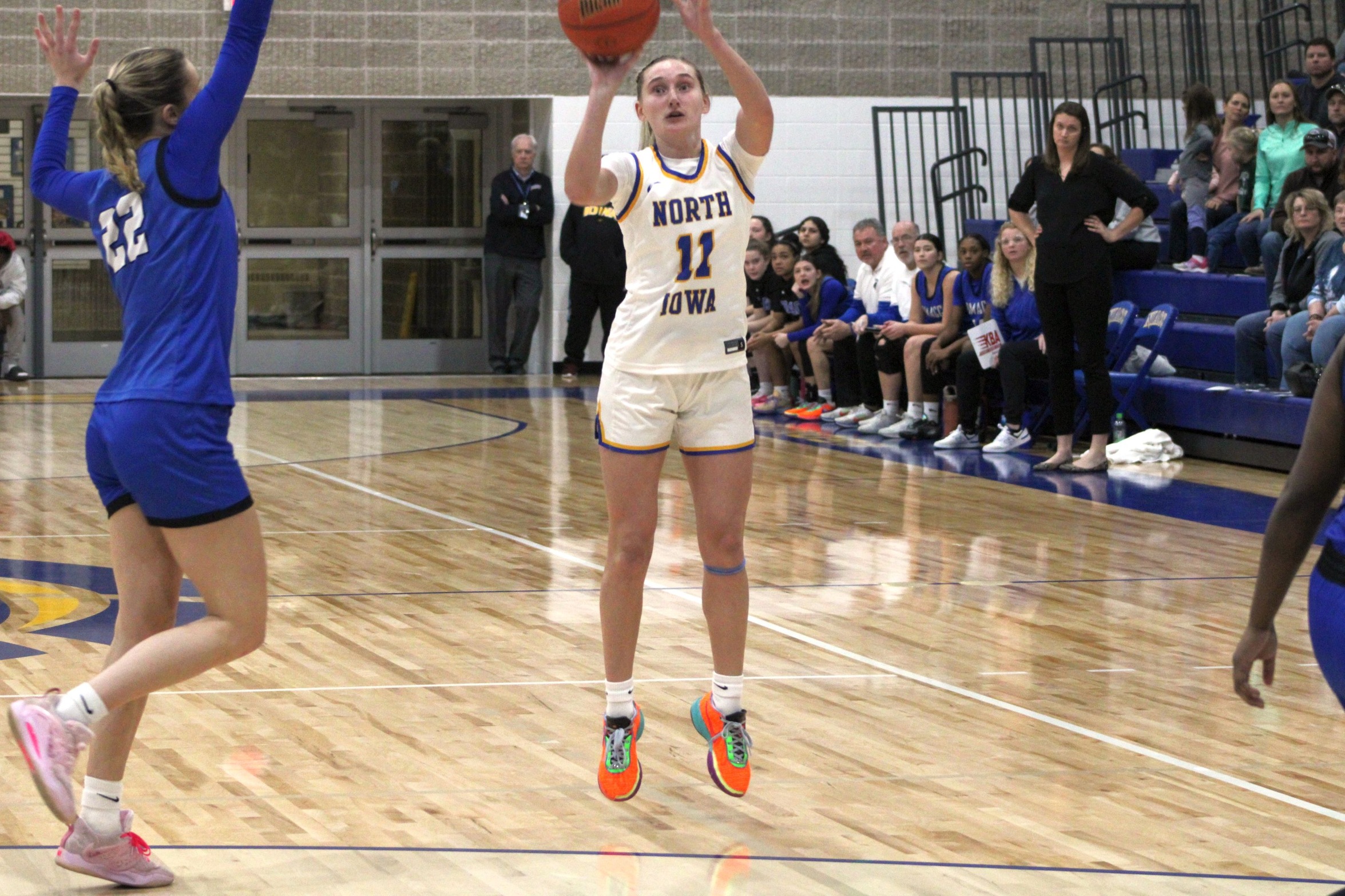 NIACC's Lilly Radcliffe knocks down a 3-point goal in Saturday's ICCAC contest against DMACC in the NIACC gym.
