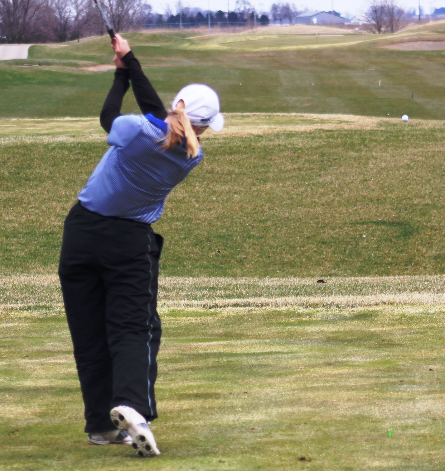 NIACC's Courtney Tusler tees off during the first round of the regional golf tournament last Friday in Ankeny.