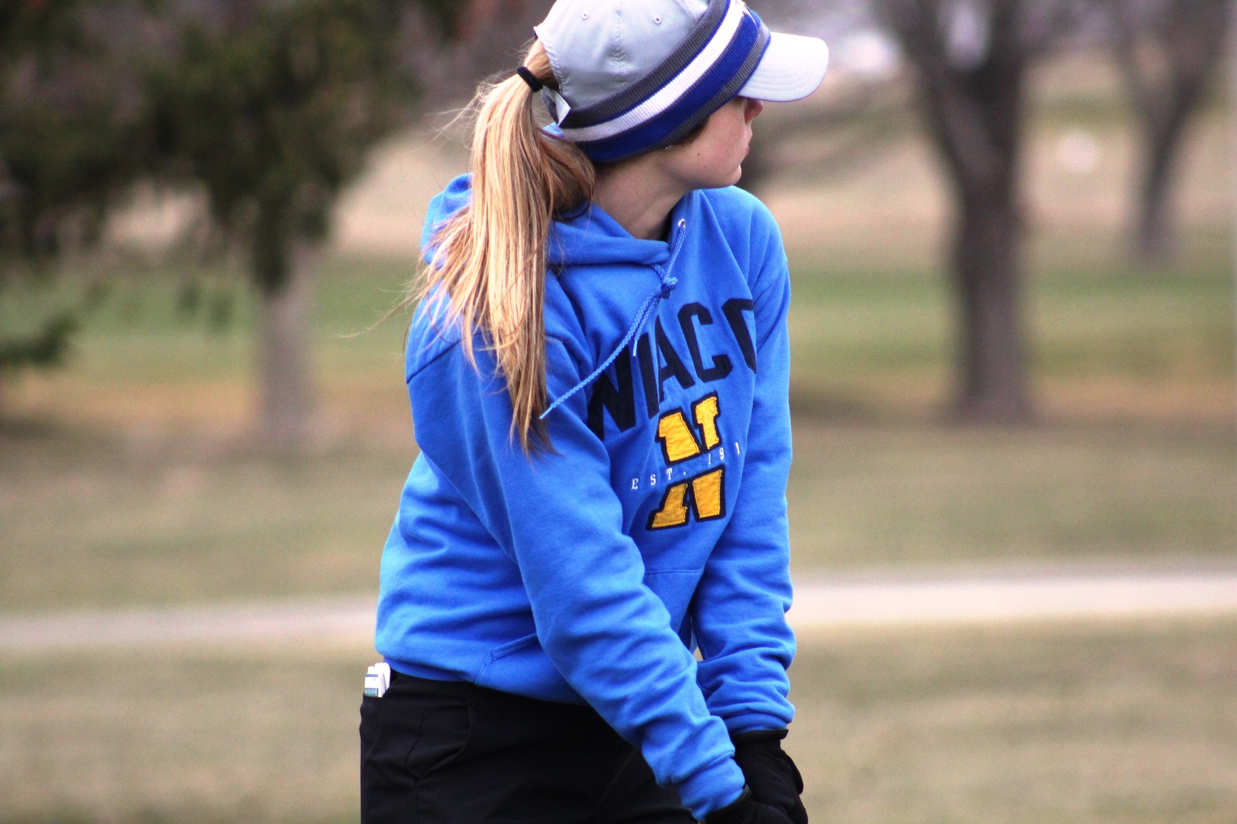 NIACC freshman Sydney Fullerton lines up her tee shot at the Lake Panorama Golf Course in Panora at a tournament on April 13.