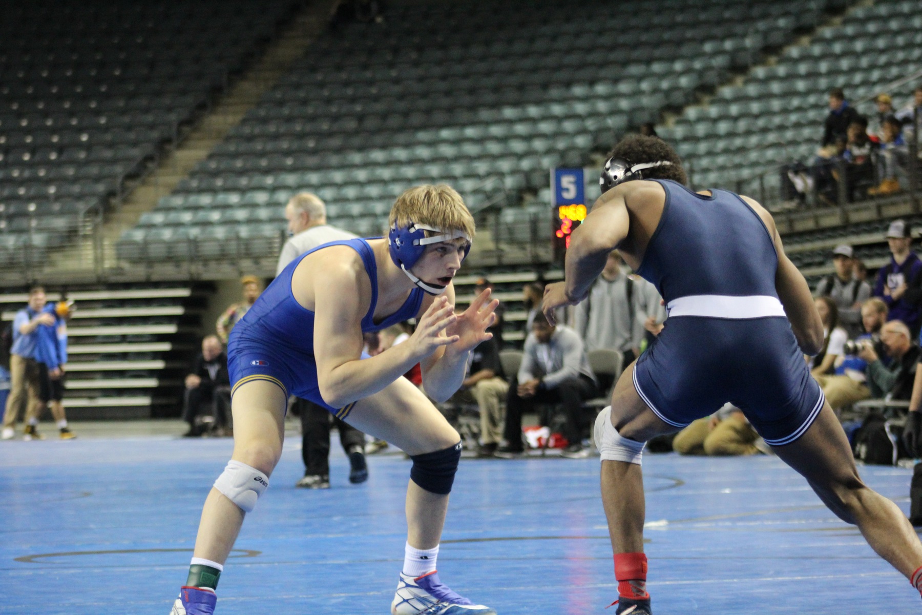 NIACC's Austin Anderly battles Iowa Central's DeAndre Reed in their fifth-place match at 141 pounds Saturday.
