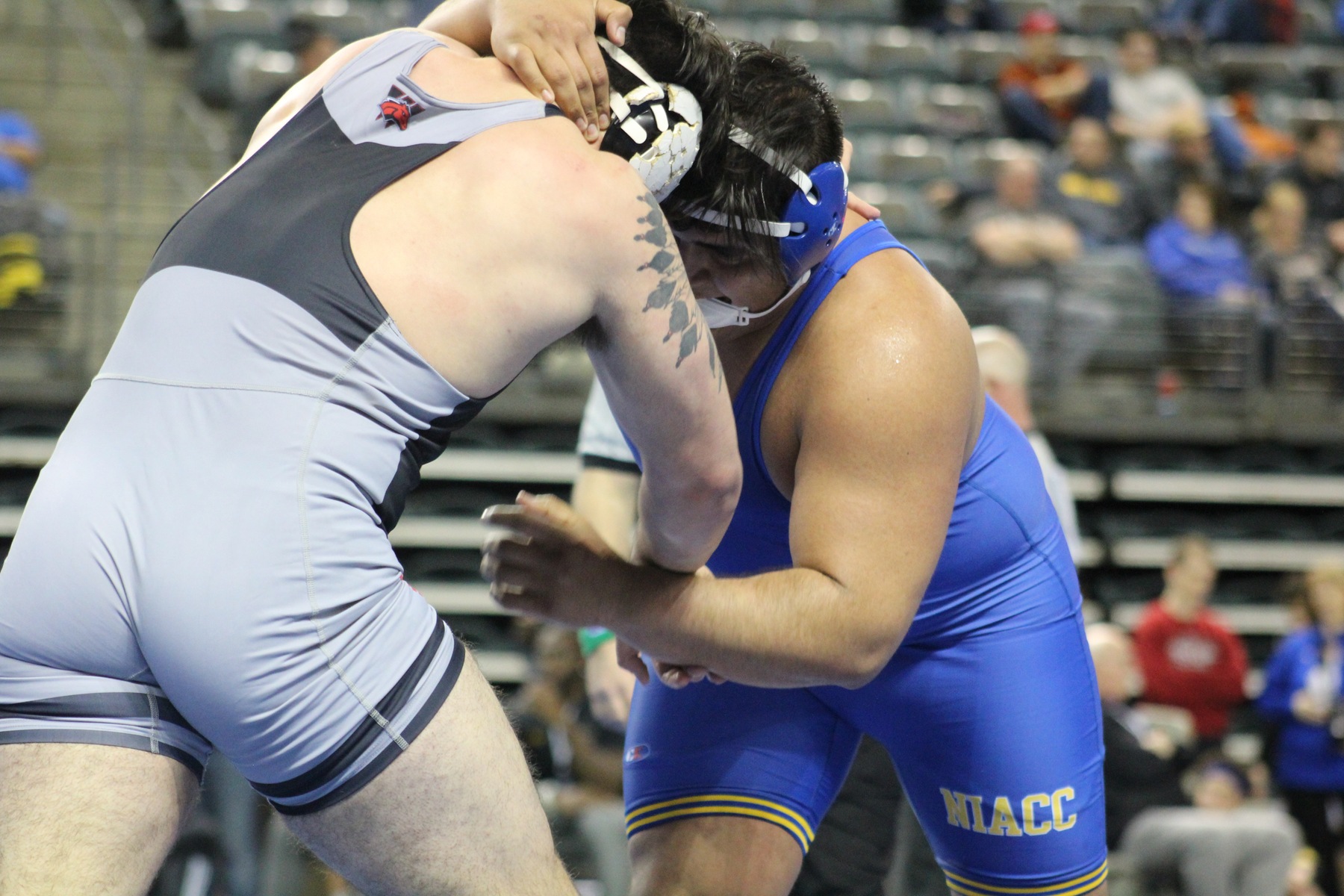 NIACC's Mario Pena battles Western Wyoming's Wade French in their first-round match at 285 pounds at the national tournament Friday.