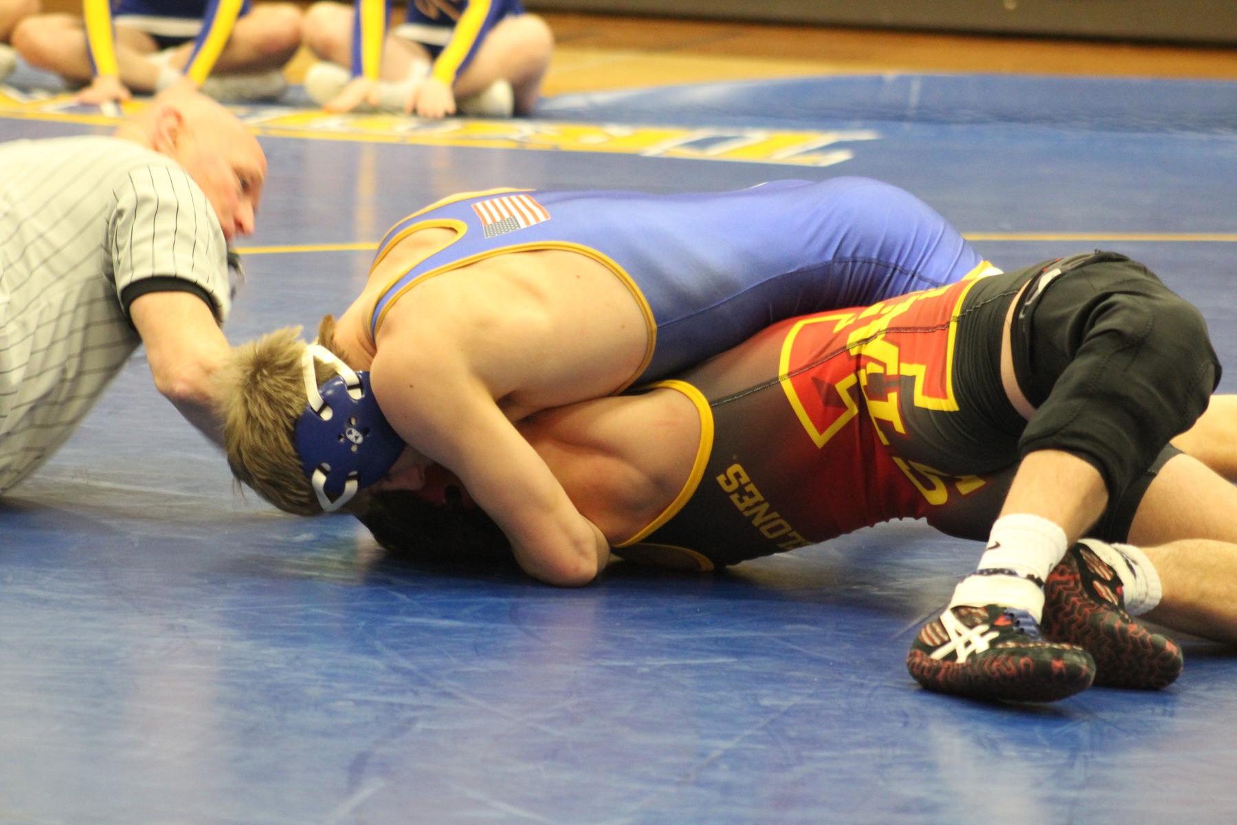 NIACC's Austin Anderly works for the fall against Iowa State's Sam Reyant in their 141-pound match Tuesday in the NIACC gym.