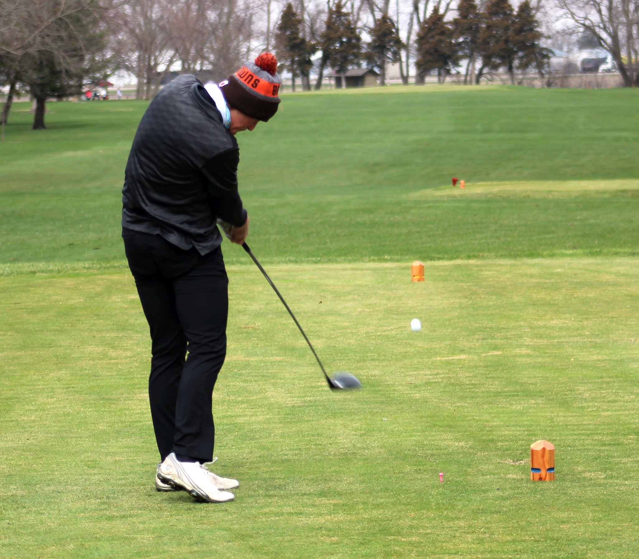 NIACC's JJ Wickman tees off at Thursday's NIACC Spring Invitational at the Mason City Country Club.