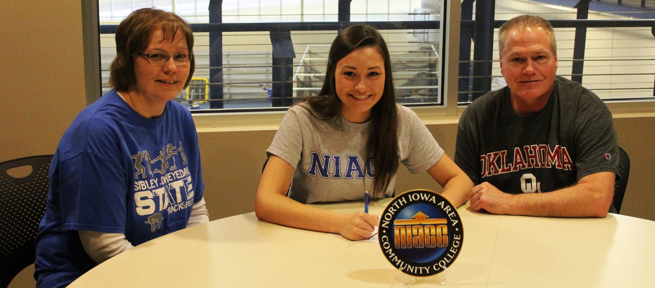 Erin Schwarzkopf of Sibley-Ocheyedan signed a national letter of intent Monday to run track and field for NIACC.