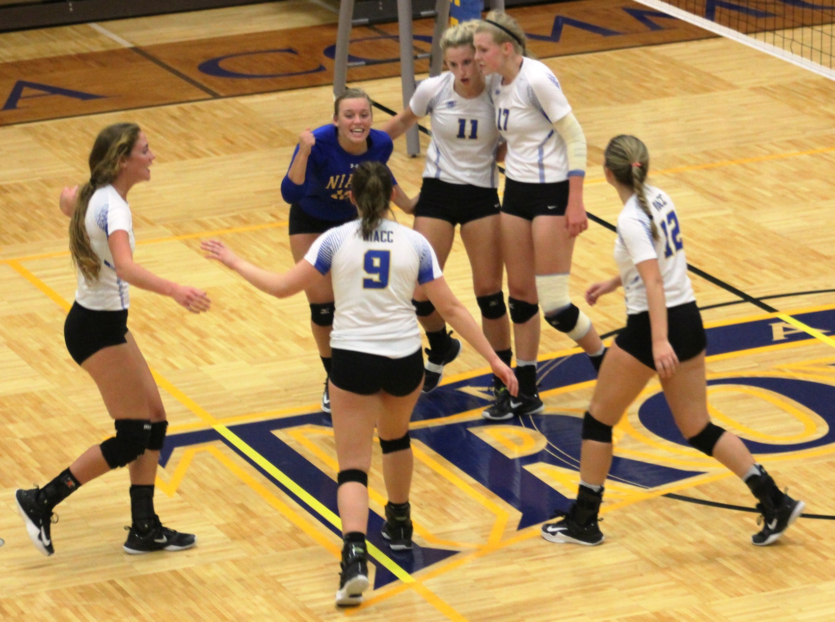NIACC players celebrate a point in Wednesday's  home match against Northeast CC.
