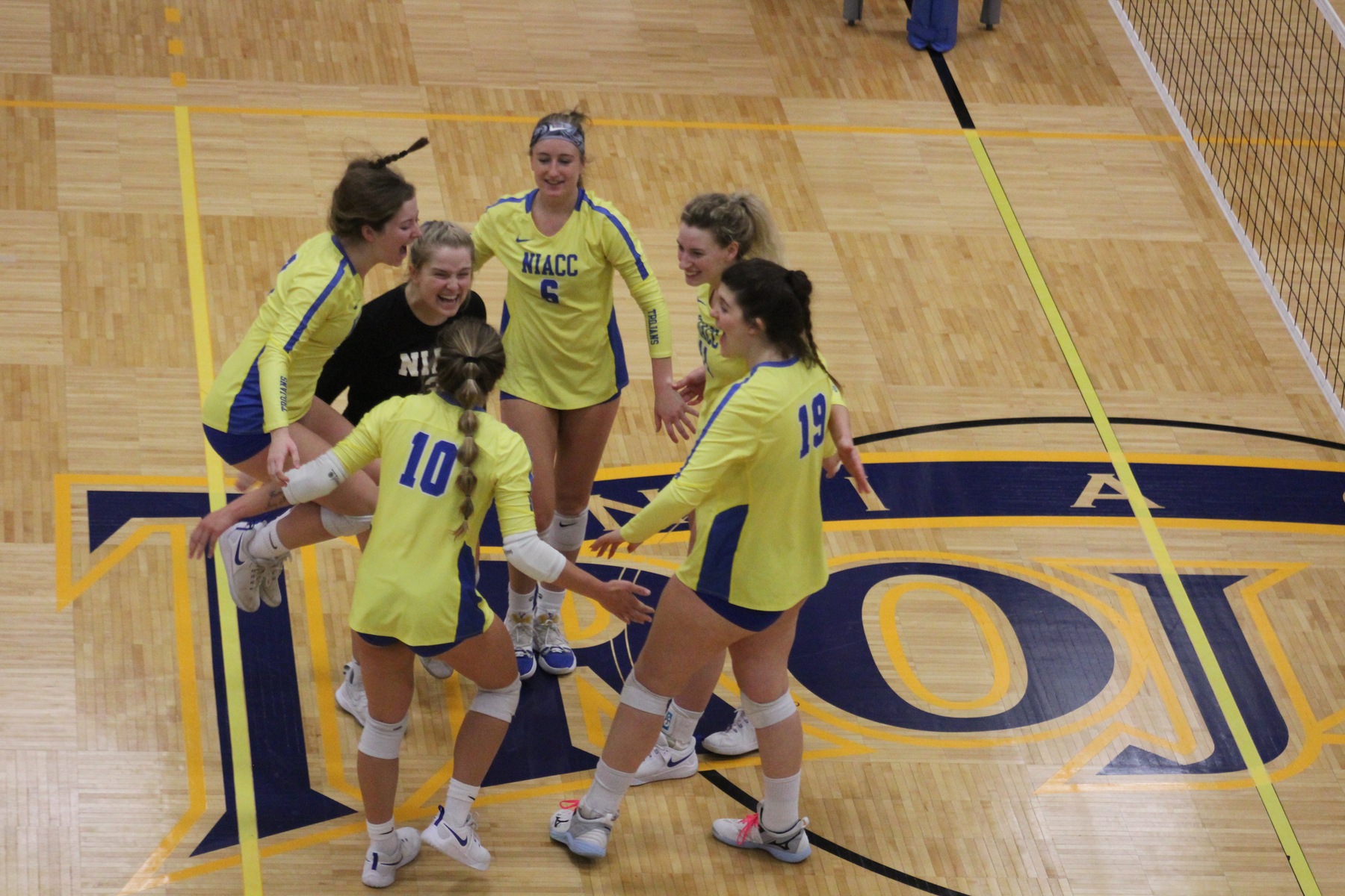 NIACC celebrates match point against Southeastern in the opening round of the regional tournament Saturday.