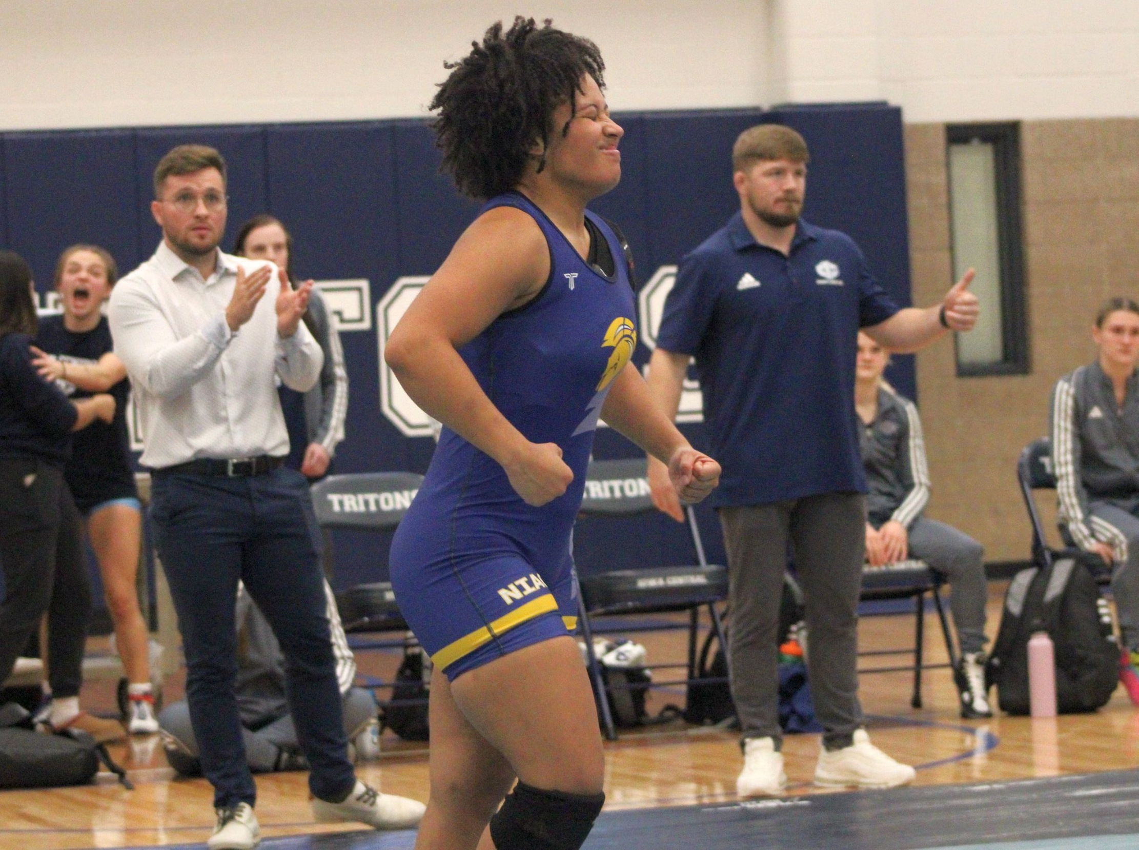 NIACC's Gabriella Segre flexes after her win at 155 pounds Wednesday at Iowa Central.