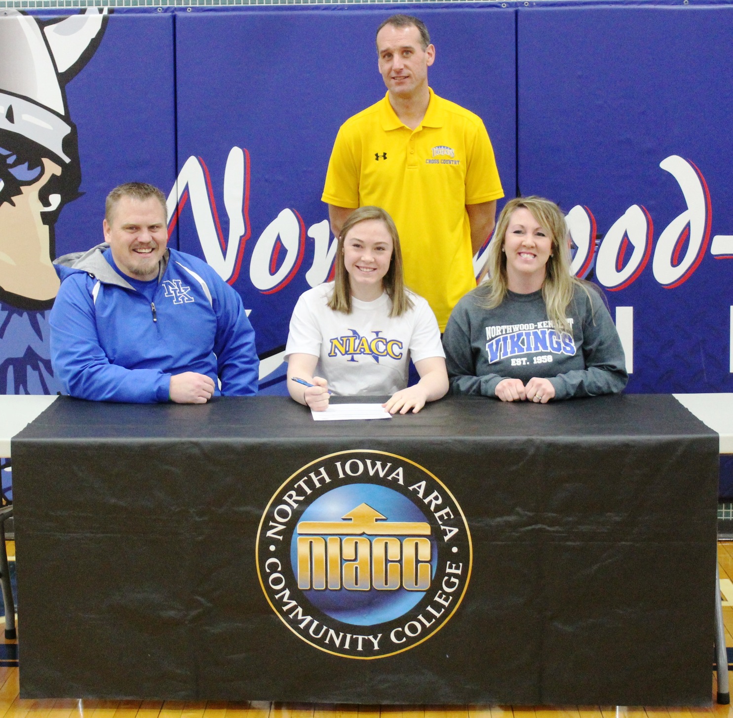 Northwood-Kensett's Ivy Rollene signed a national letter of intent Tuesday to run cross country and track and field at NIACC next season.