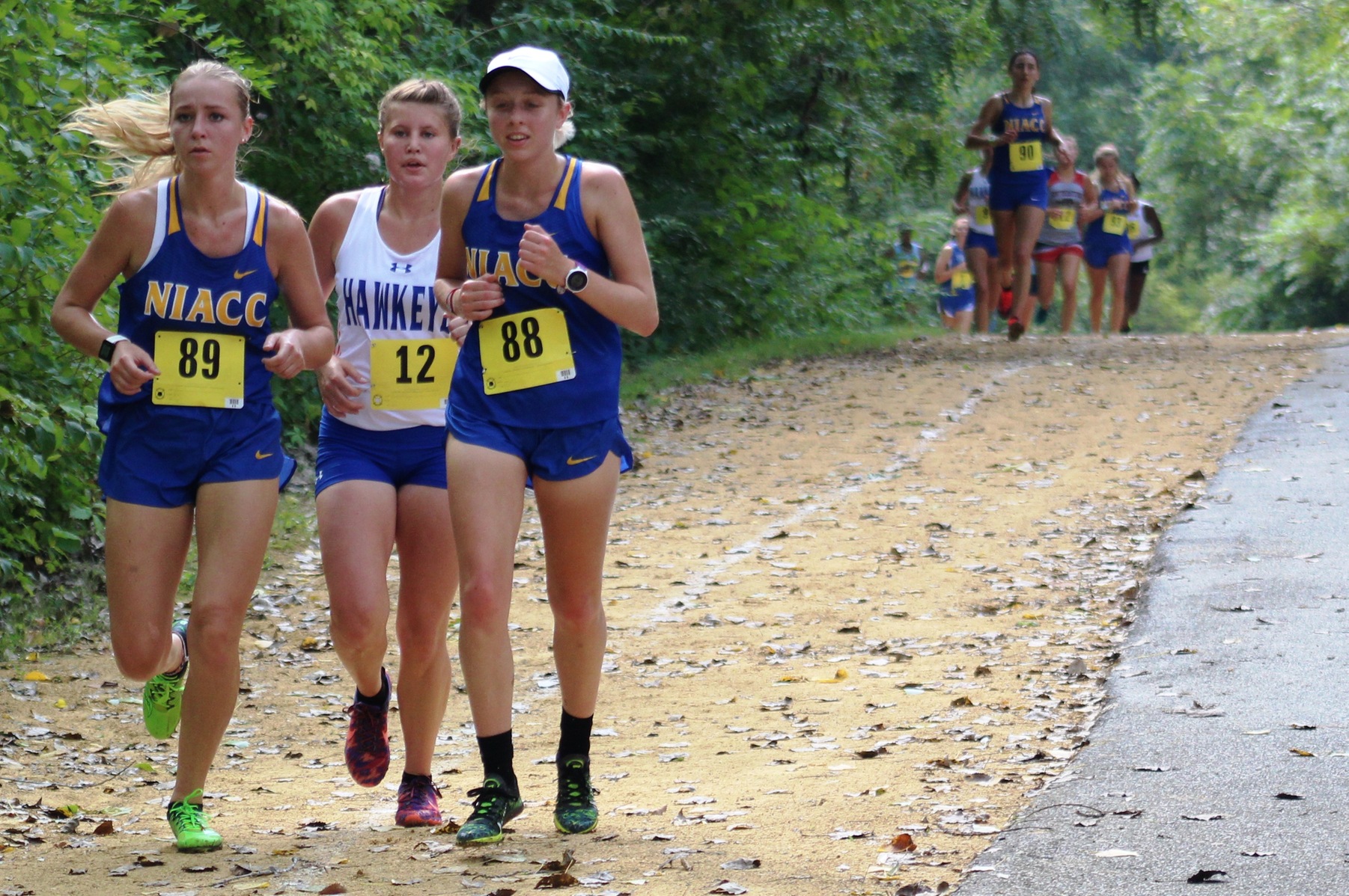 NIACC's Cecelia Hemsworth and Julia Dunlavey run at the regiona time trial in Davenport in August.