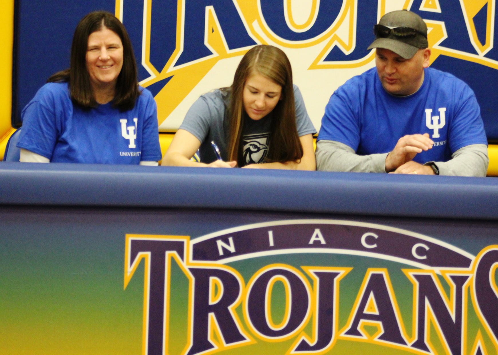 NIACC's Kaitlyn Carlson signs national letter of intent Wednesday with Upper Iowa University.