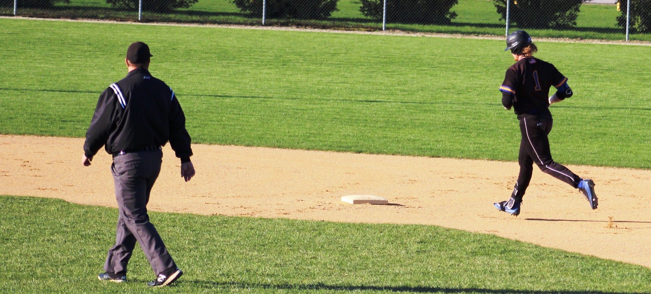 NIACC's Fox Leum rounds the bases after a home run at Ellsworth last Friday.