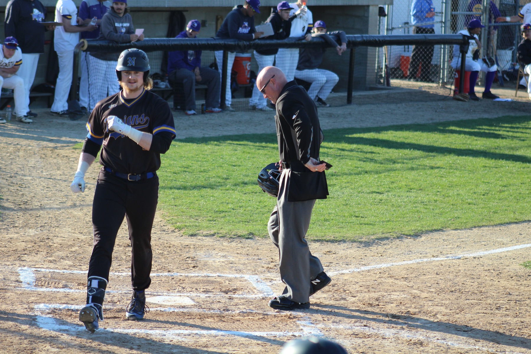 NIACC's Fox Leum crosses home plate after hitting a home run in the second game of Friday's doubleheader at Ellsworth.