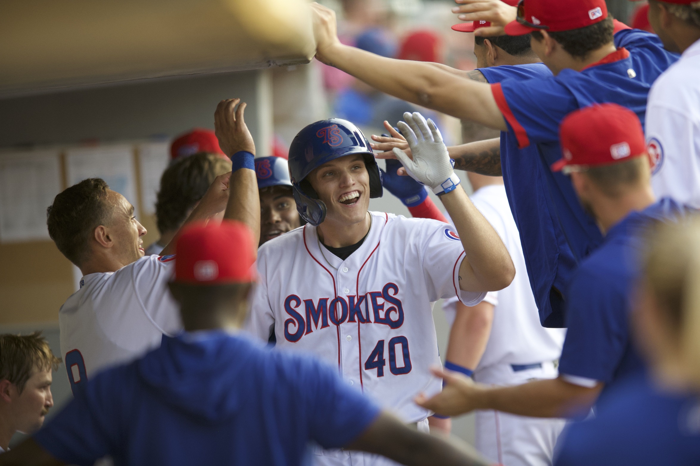 Bryce Ball of the Tennessee Smokies smiles in the dugout during a game this season. Photo courtesy of the Tennessee Smokies.