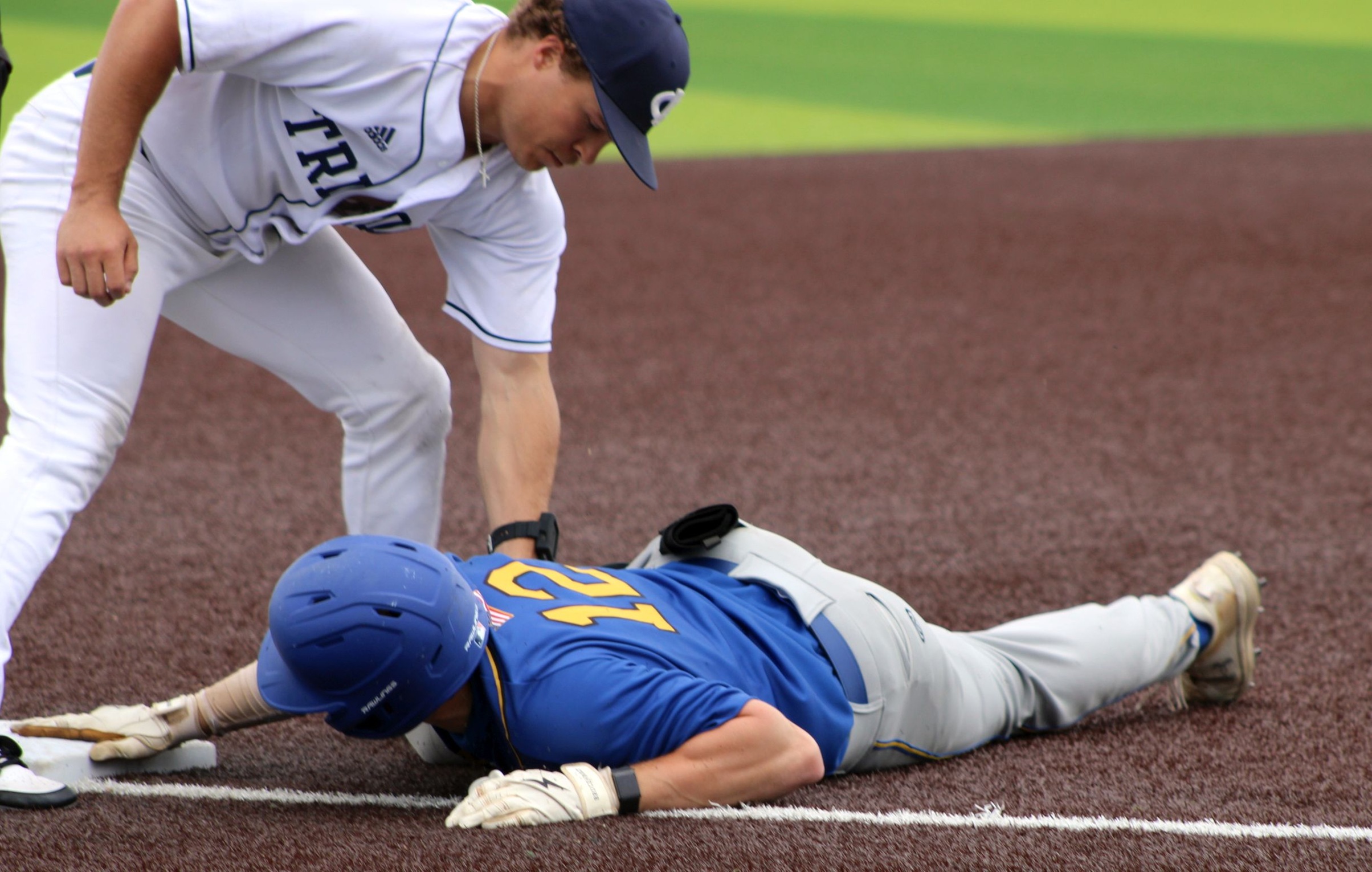 NIACC's Will Couchman slides into third base with a triple in Thursday's game against Iowa Central at the regional tournament in Fort Dodge.