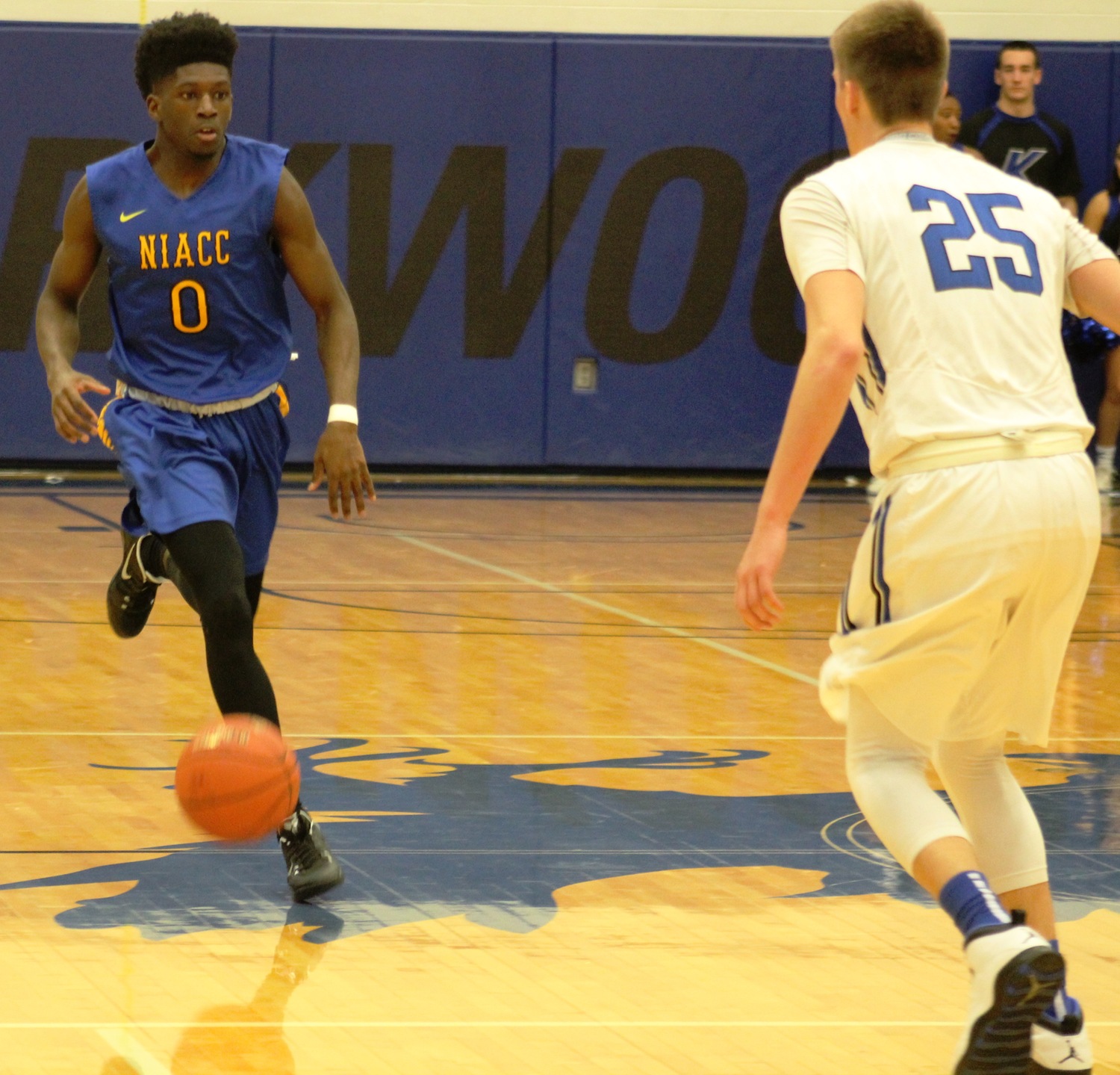 NIACC's James Harris brings the ball up the court in Saturday's game at Kirkwood.