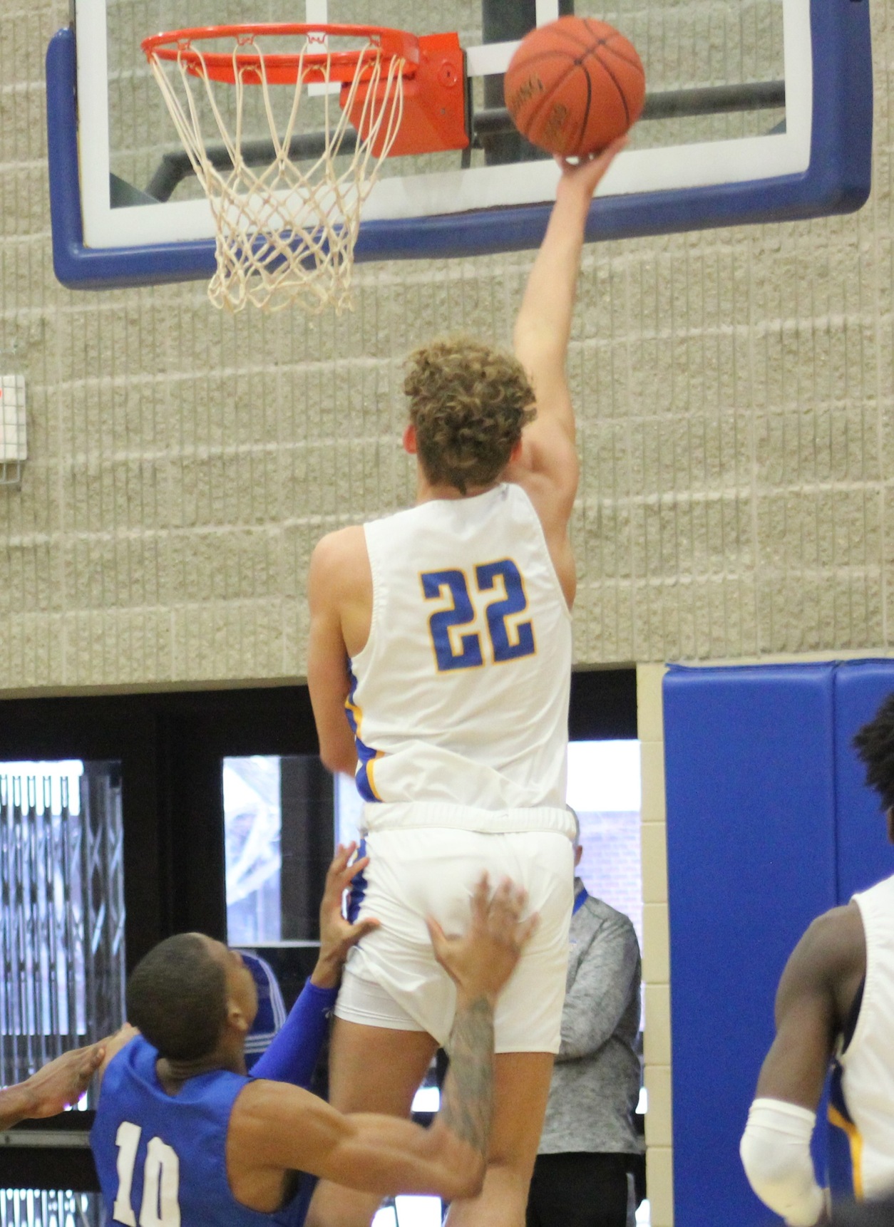 NIACC's Chandler Dean converts a layup in the first half of Saturday's game against DMACC.