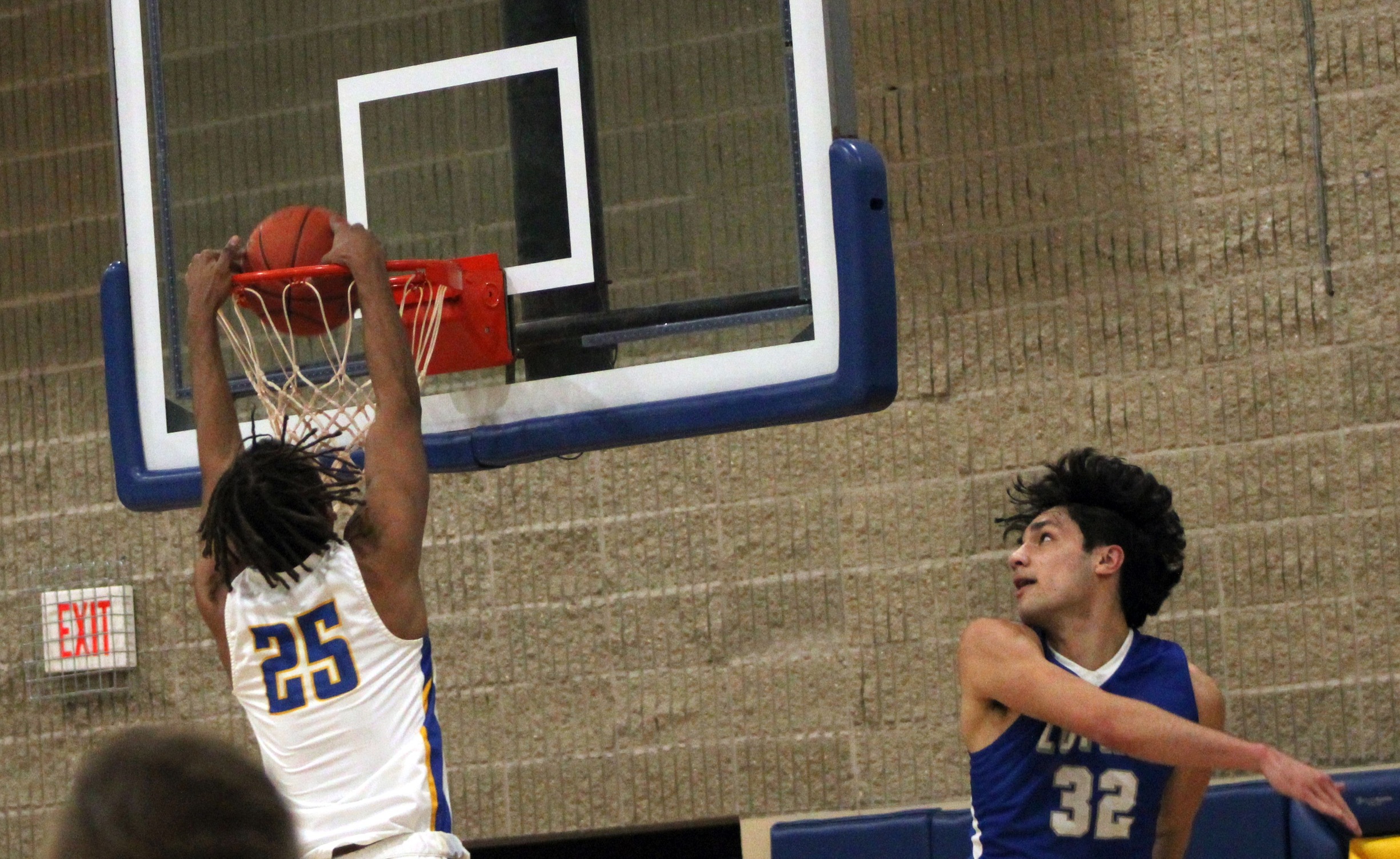 NIACC's Trey Woolsey dunks for 2 points in Monday's 90-60 win over the Luther College Junior Varsity in the NIACC gym.