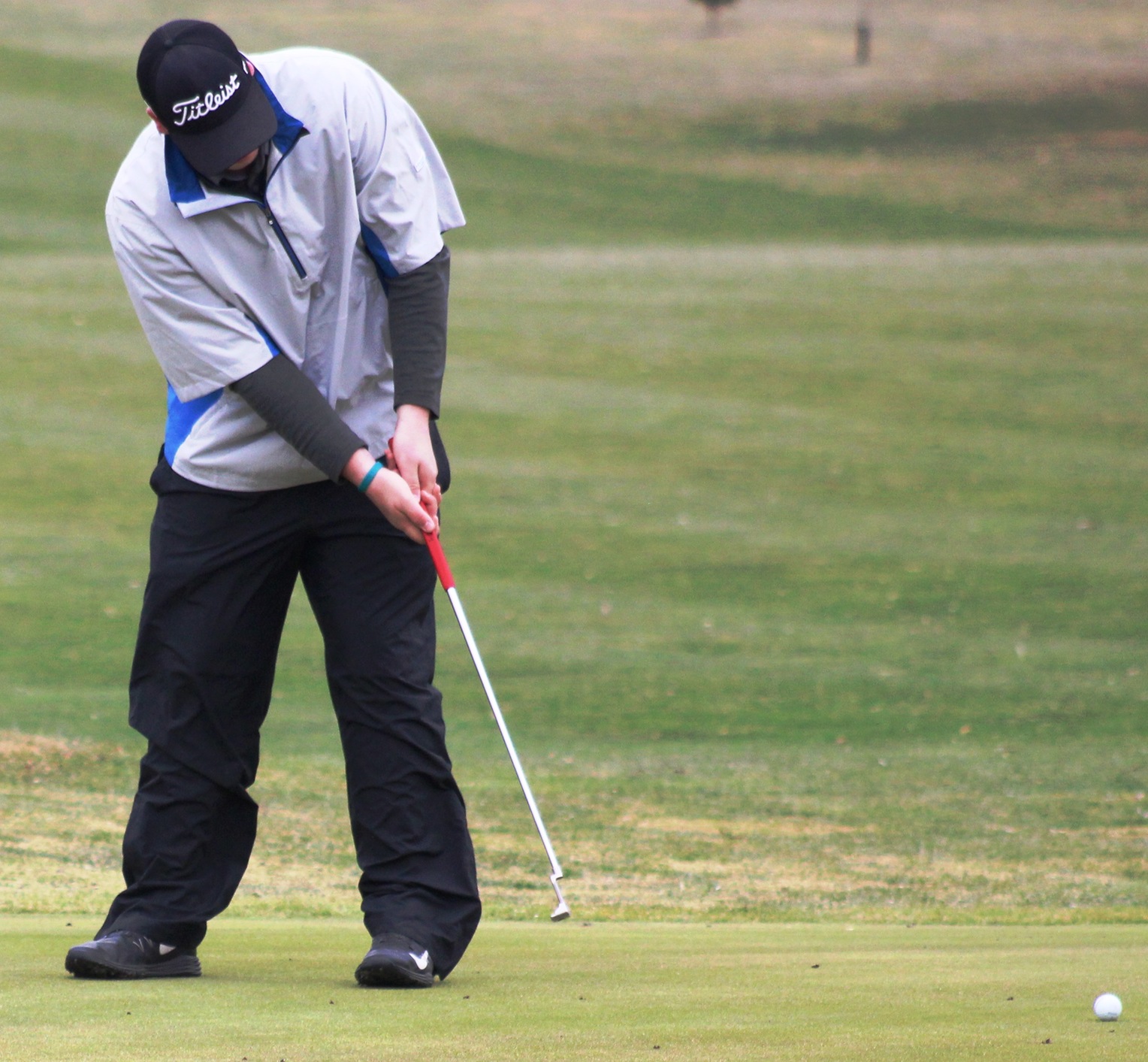 Devin Koob putts on hole No. 1 on Friday at the Lake Panorama Golf Course.