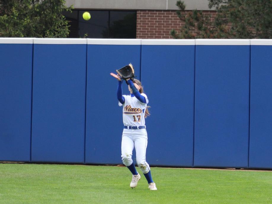 NIACC center fielder Kaitlyn Carlson catches a fly ball in Sunday's second game.
