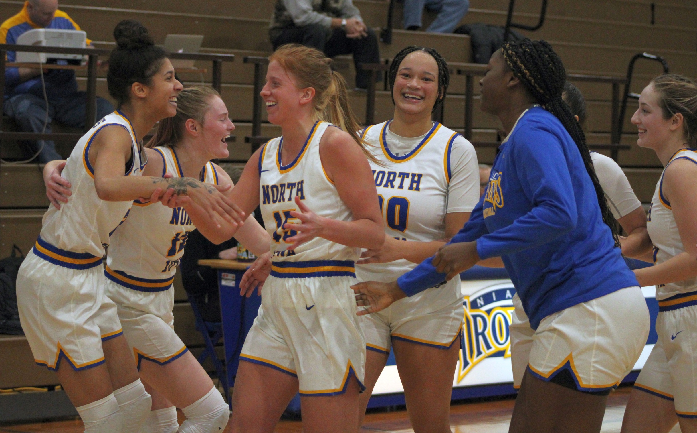 The NIACC women's basketball team celebrates after knocking off No. 6 Iowa Western 59-54 Wednesday in the NIACC gym.