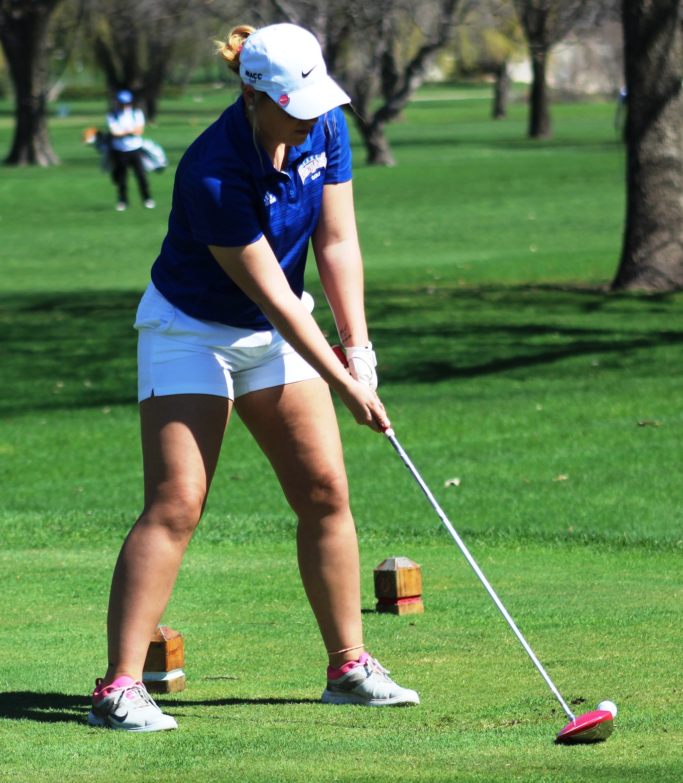Brooke Maasch tees off at the NIACC Invitational on April 17 at the Mason City Country Club.