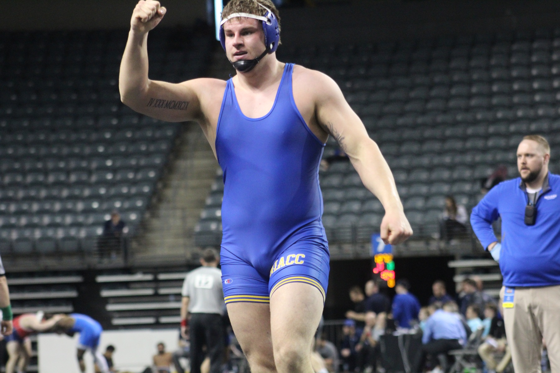 NIACC's Zach Santee celebrates his second-round pin at 285 pounds at the national wrestling tournament in Council Bluffs.