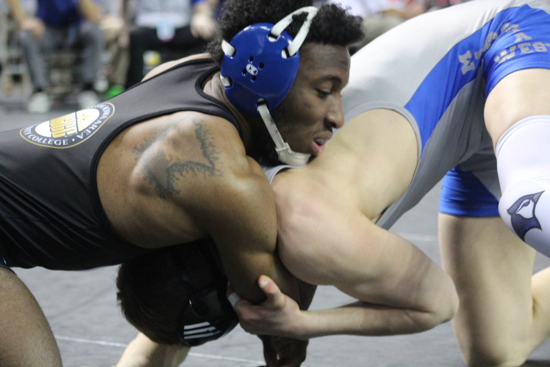 NIACC's Kendall Sandifer controls Minnesota West's Braydon Johnson in his first round match at 157 pounds.