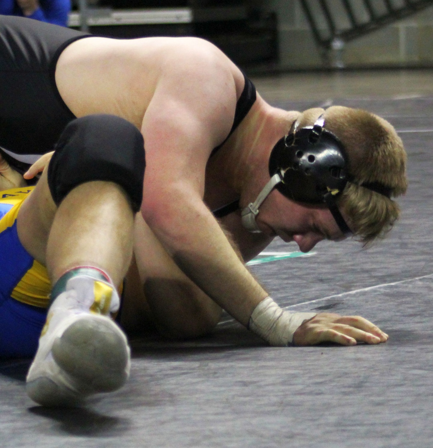 NIACC's Holton Truax works for the fall against Muskegon's Jake Renfer in 2:32 in Friday's 197-pound consolation match.