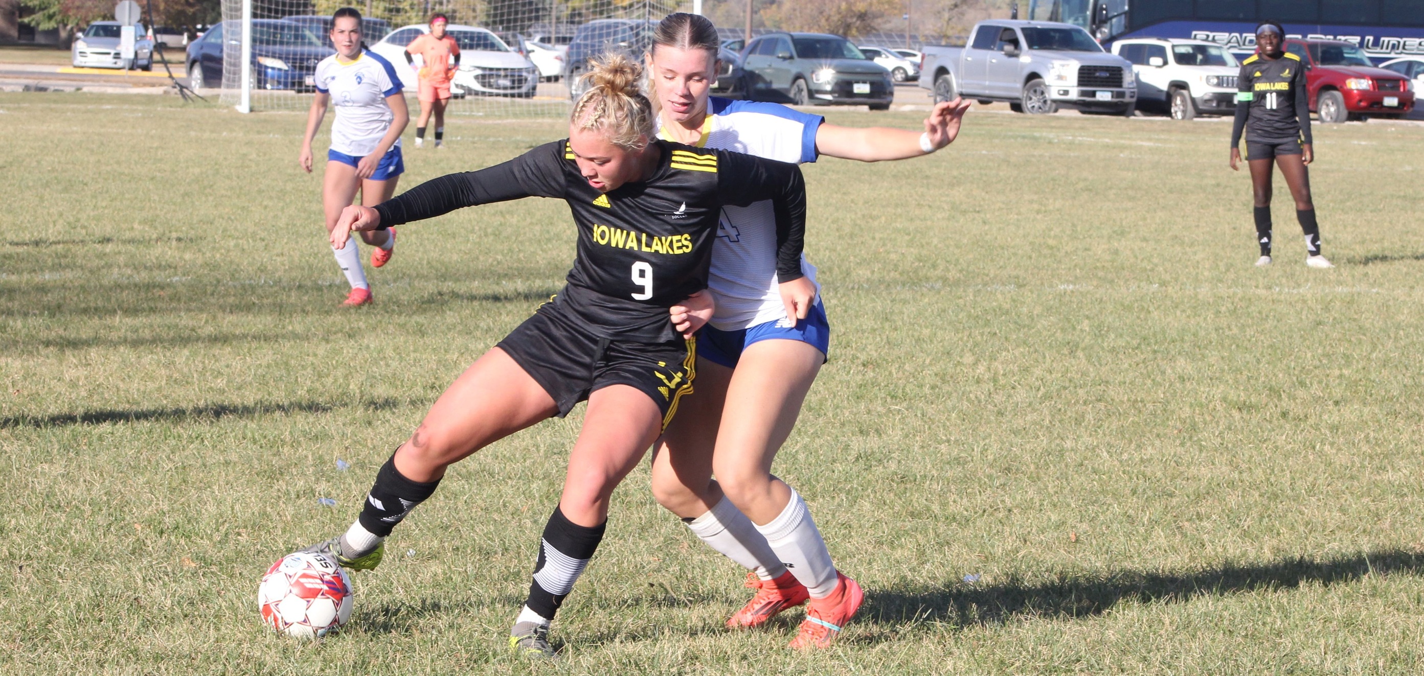 NIACC's Emmalyse Bordignon battles for the ball during a match earlier this season against Iowa Lakes.