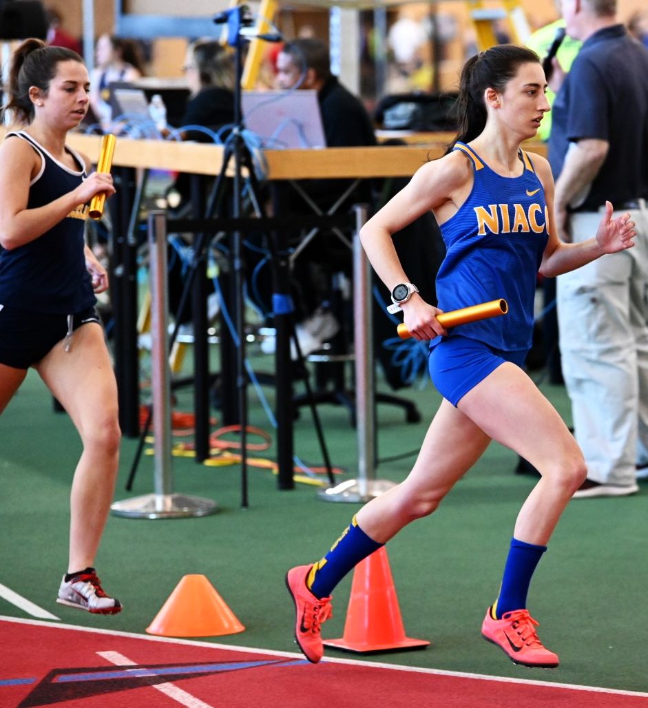 NIACC's Caitlyn Regan runs a leg on the distance medley relay on Saturday at the Grinnell Invitational.