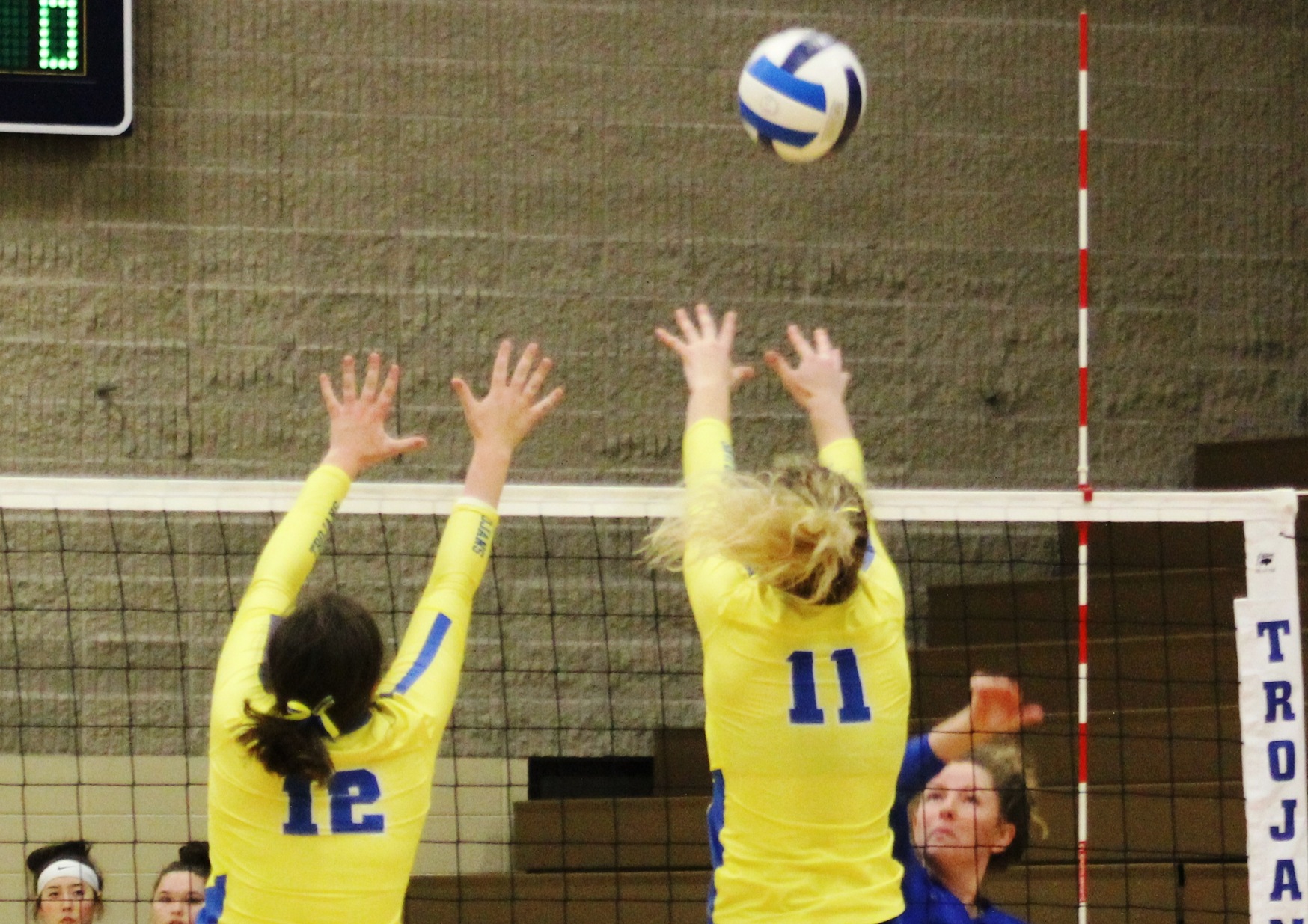 NIACC's Hannah Hanson (12) and Shelby Heston try for the block in Wednesday's match against Iowa Lakes.