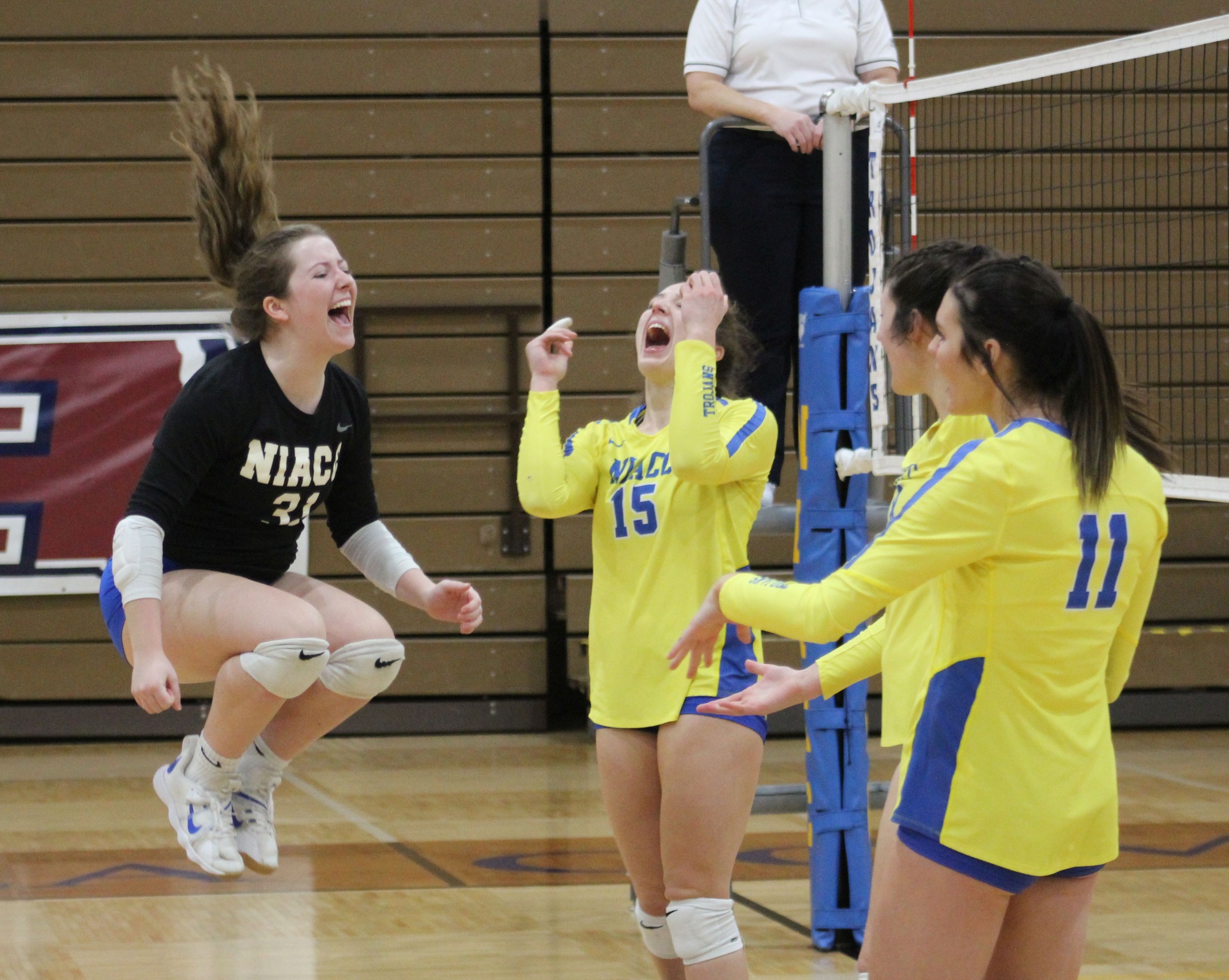 NIACC players celebrate a point in Wednesday's home match against Iowa Lakes.