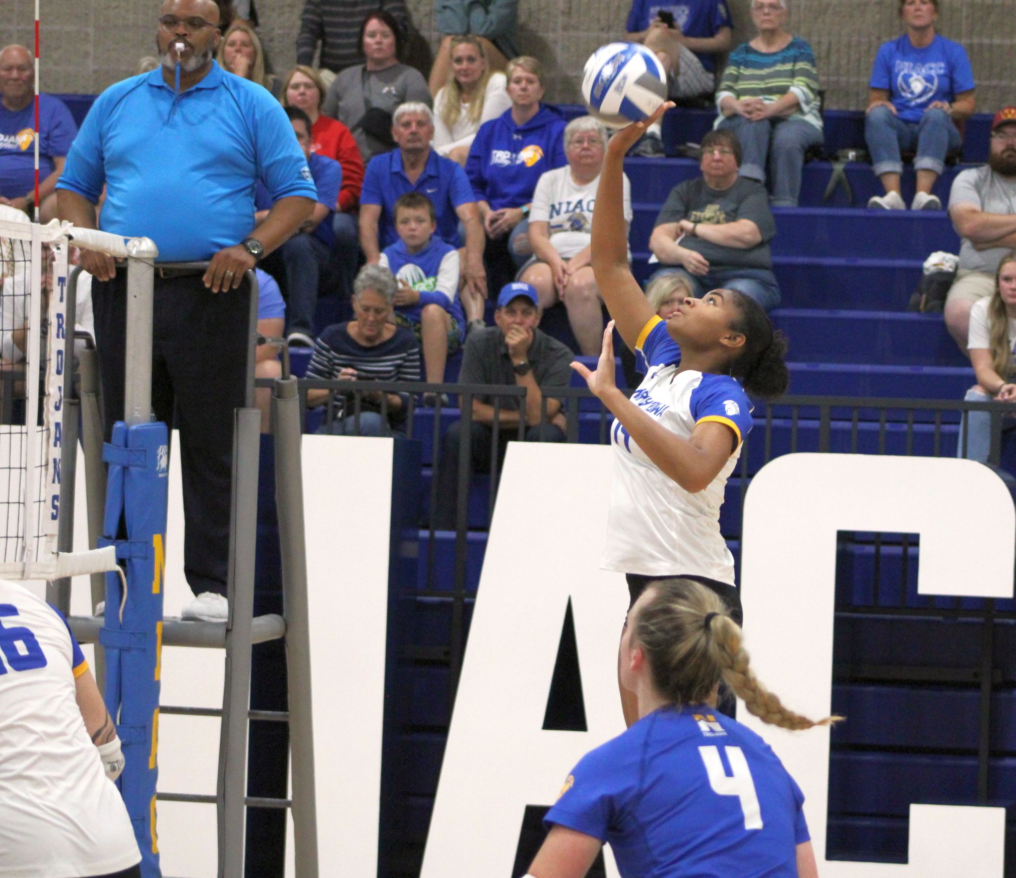 NIACC freshman Zhane Singer hits the ball over the net in Tuesday's match against Iowa Central.