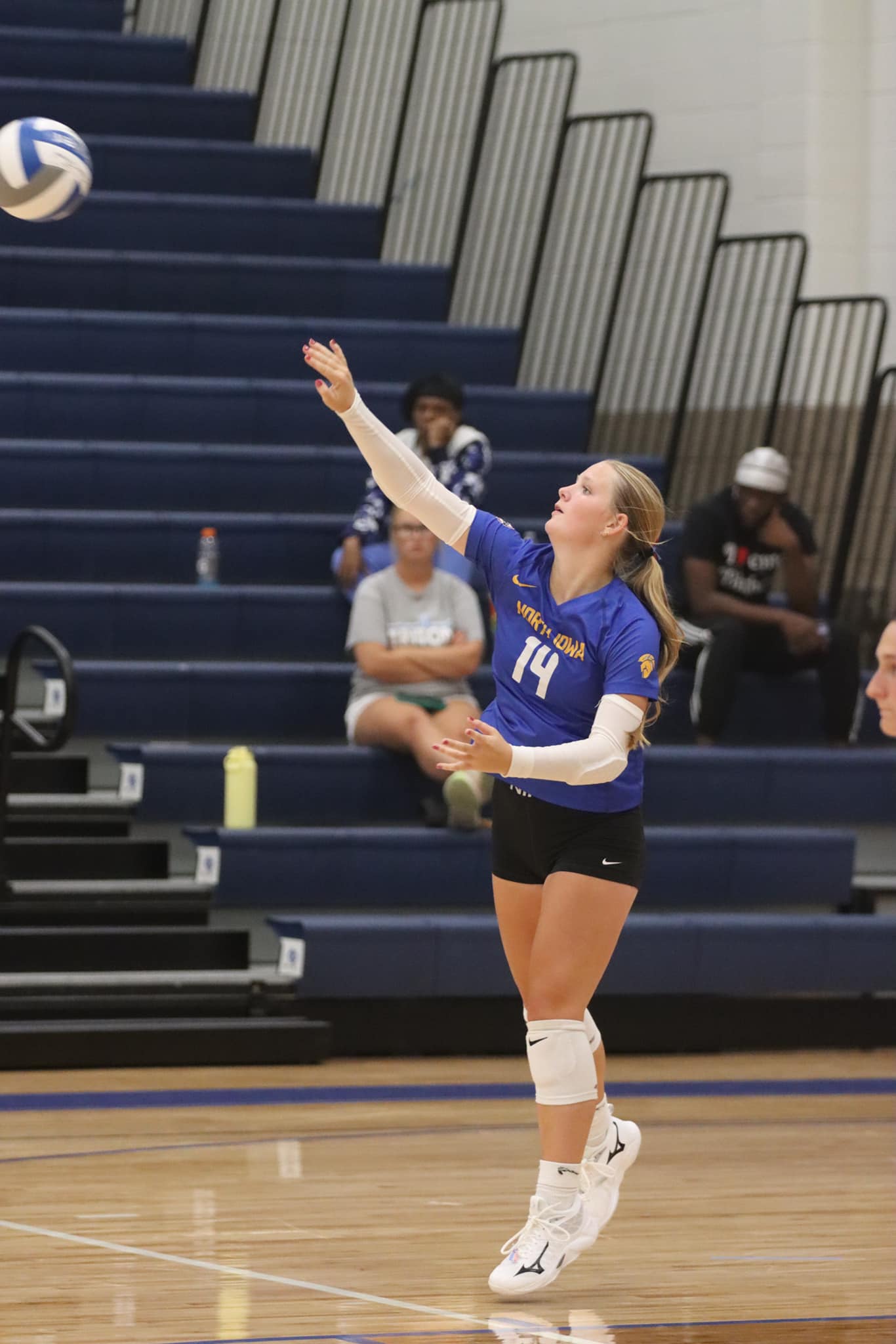 NIACC's Kenedee Frayne serves during Wednesday's match at Iowa Central.