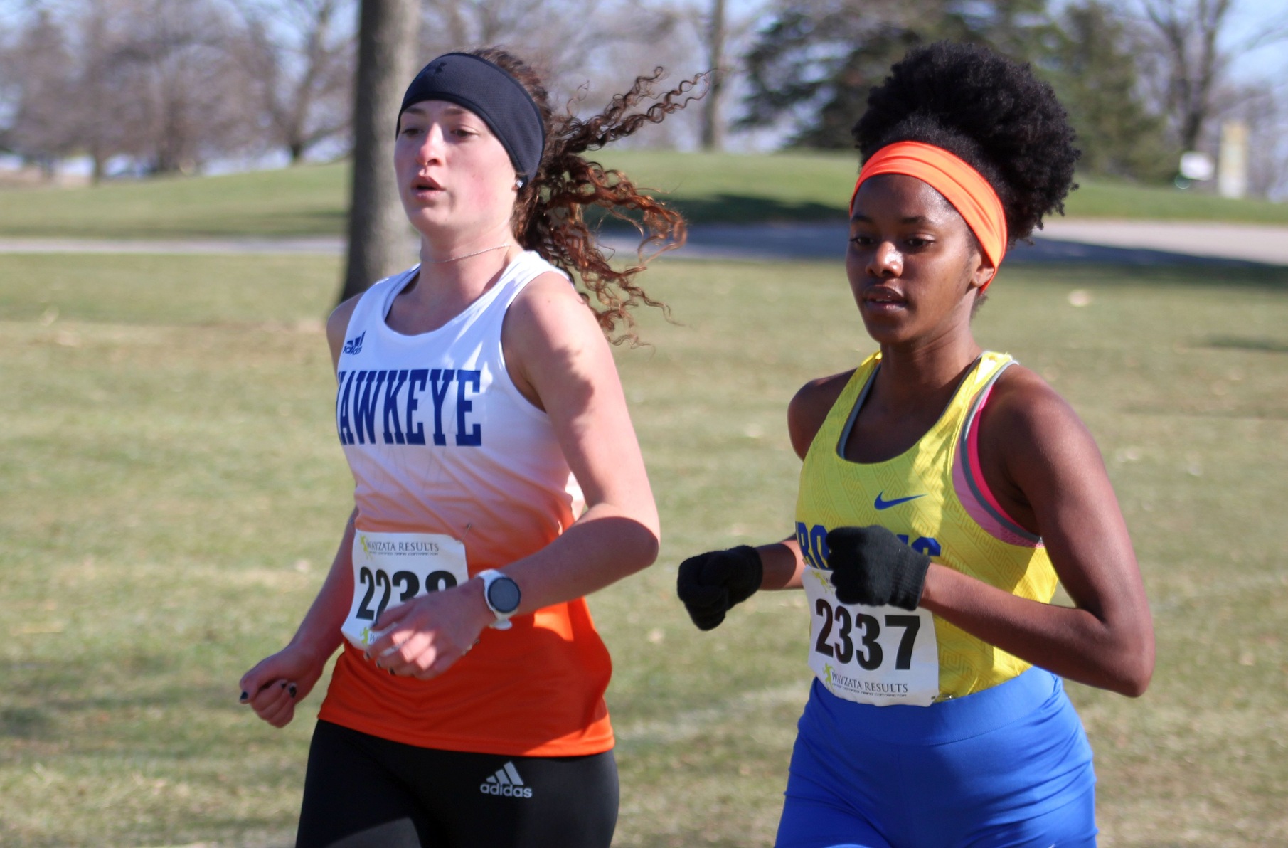 NIACC's Sarah Bertry (right) runs at the 2020 regional meet in Fort Dodge on Nov. 1.